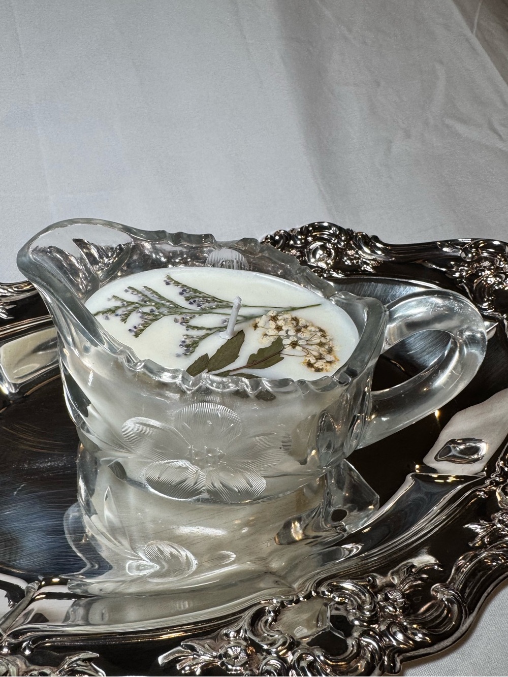 Decorative Glass Floral Candle in Clear Pitcher
